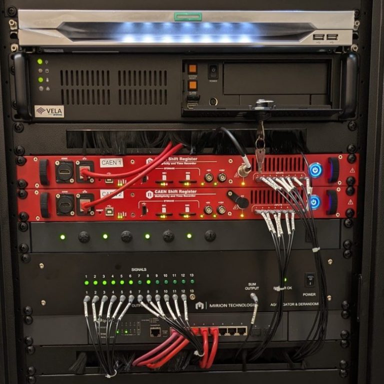 19-inch rack cubical containing the NM-2023 data acquisition electronics.