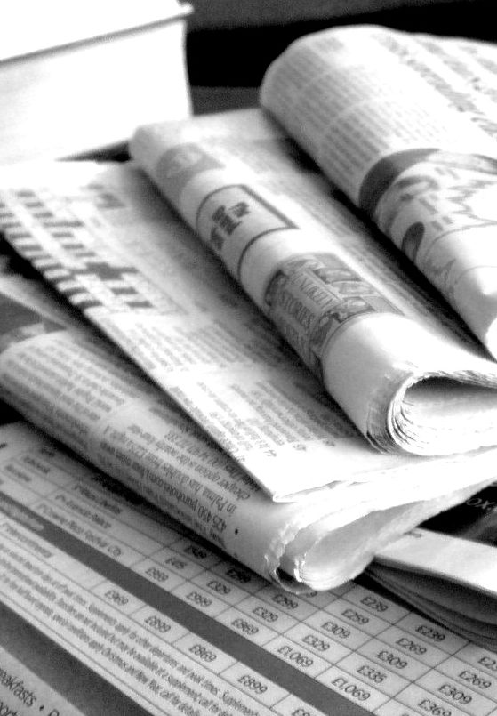 "Newspapers B&W (3)" by NS Newsflash is licensed under CC BY 2.0. "Newspapers B&W (3)" by NS Newsflash is licensed under CC BY 2.0.